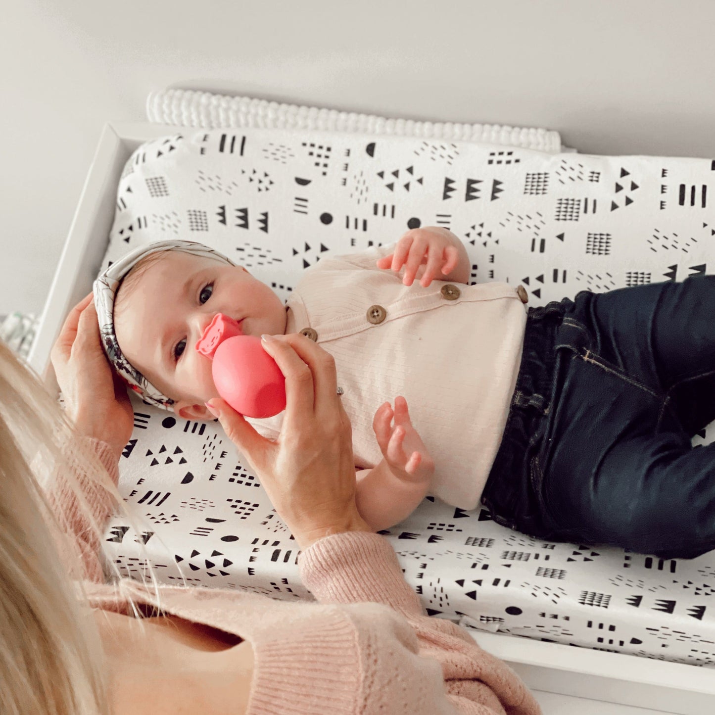 baby using oogiebear bulb aspirator