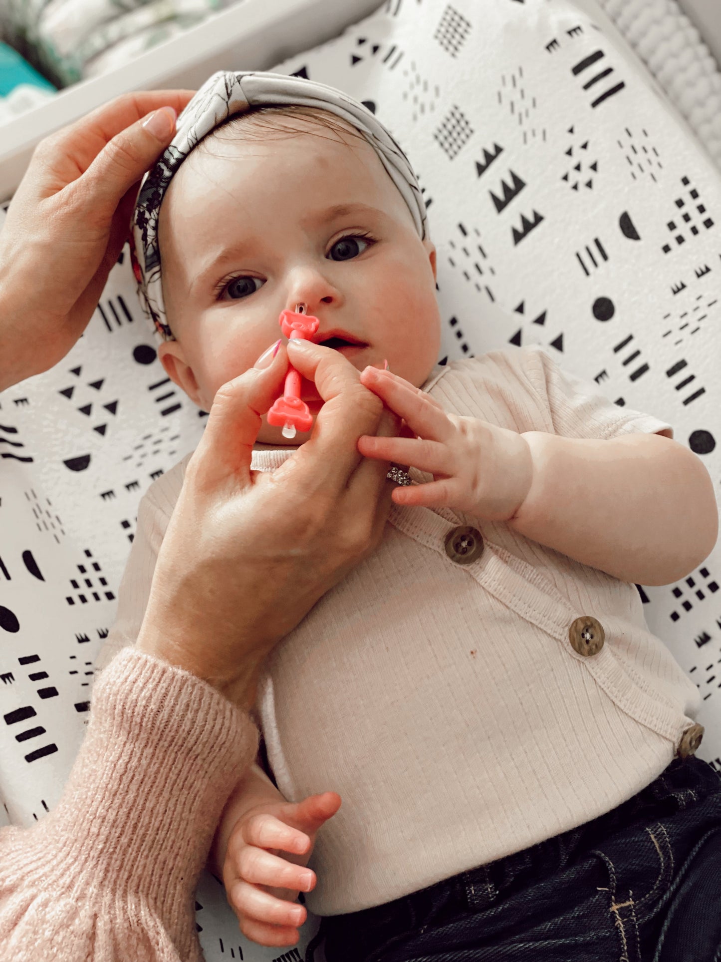 baby using oogiebear bear pair