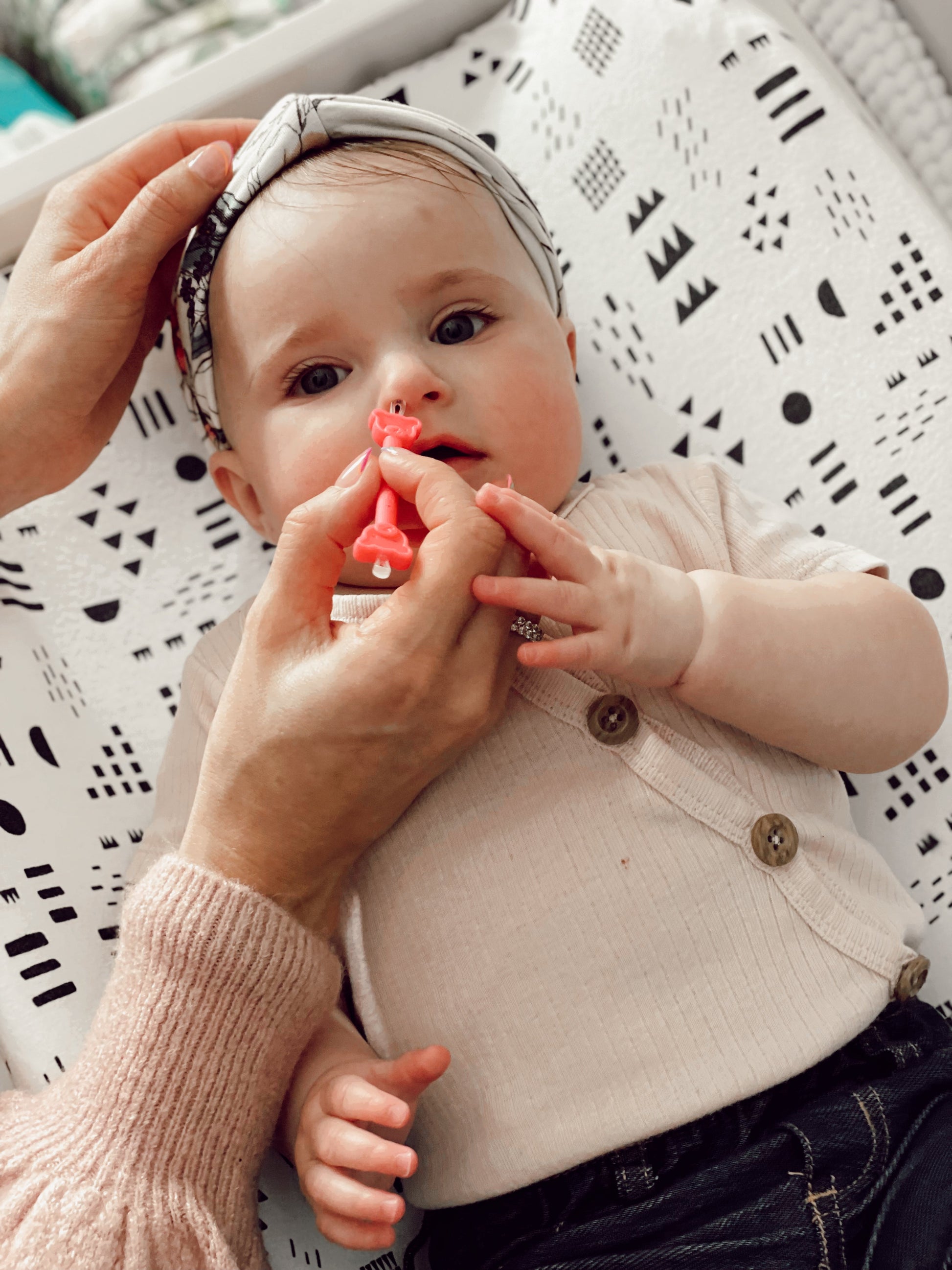 baby using oogiebear bear pair
